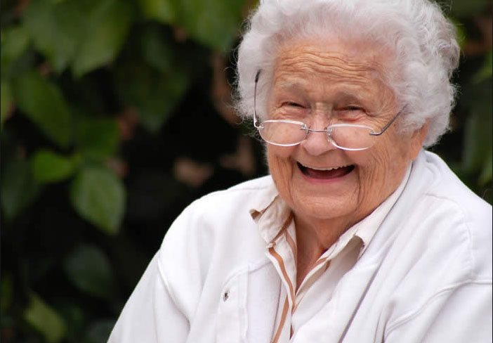 smiling elderly woman with white hair